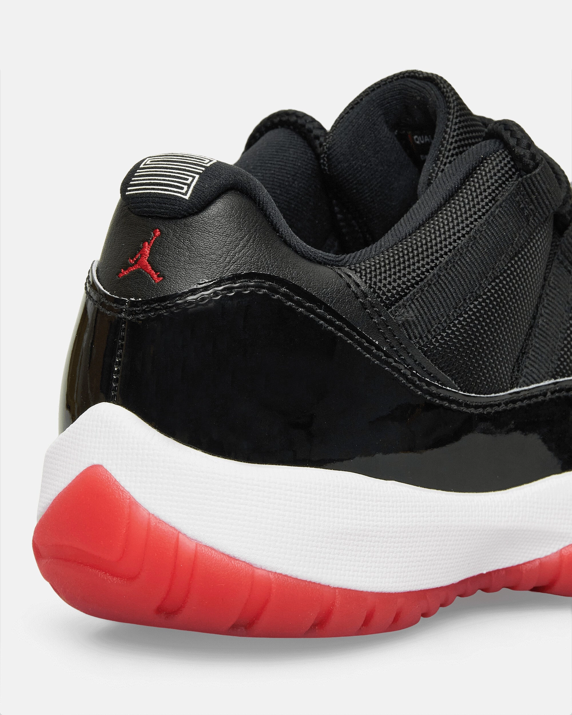 Air Jordan 11 Low Sneakers Bred